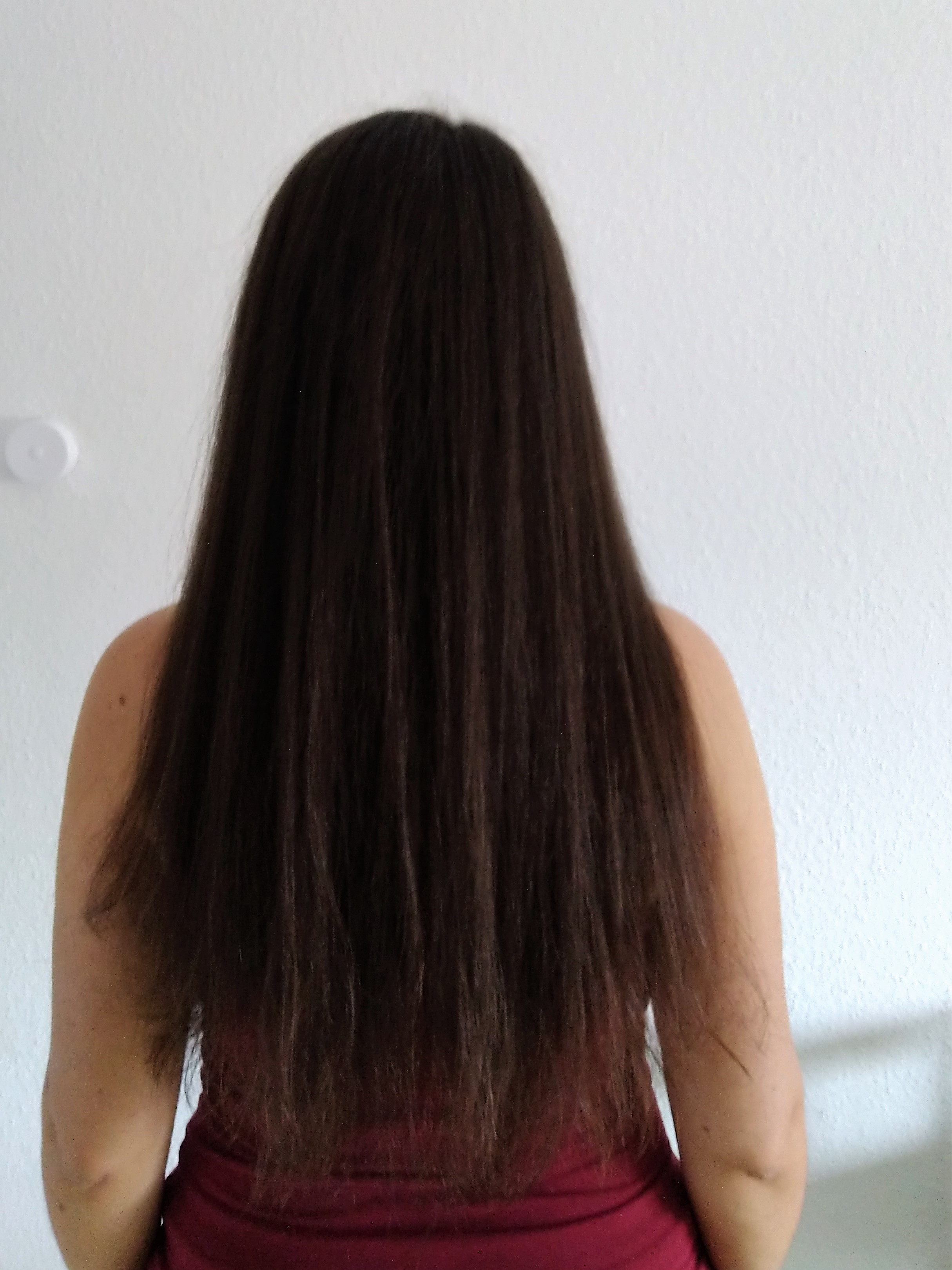 Long hair before cutting - back view